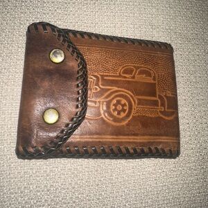 Vintage hand-tooled leather trucker’s wallet with Truck image